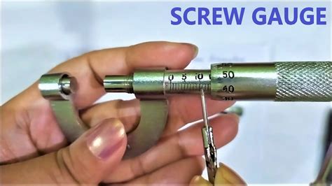 measure thickness using screw gauge|determine head size of screw.